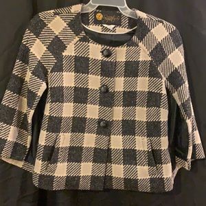 Cape pea coat style, very cute and sophisticated, purchased at a local boutique